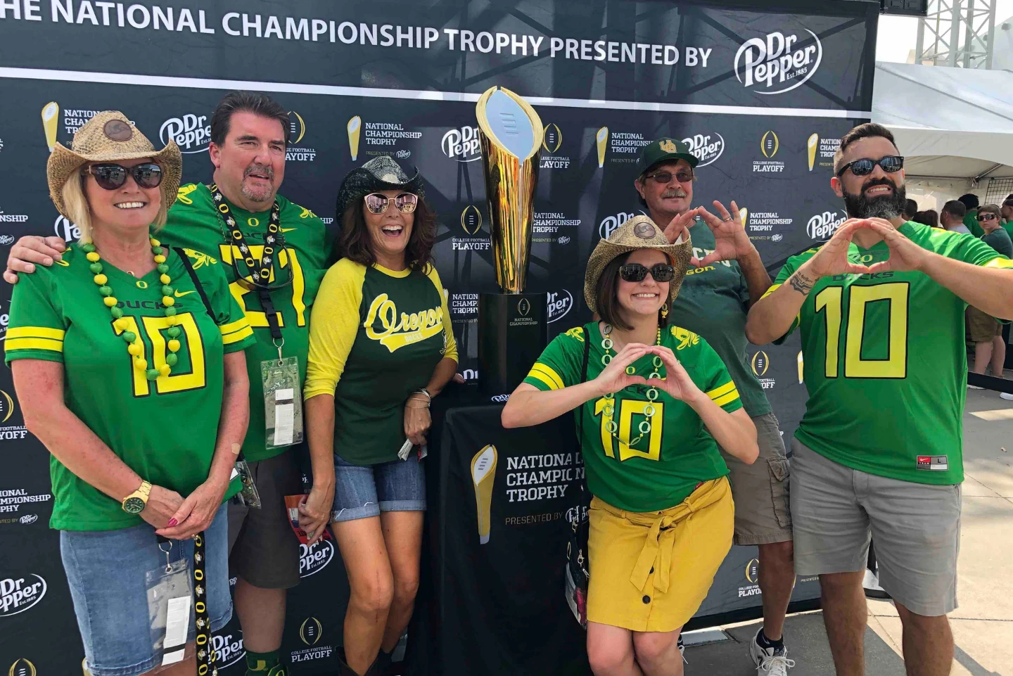 Oregon Fans with the College Football National Championship Trophy